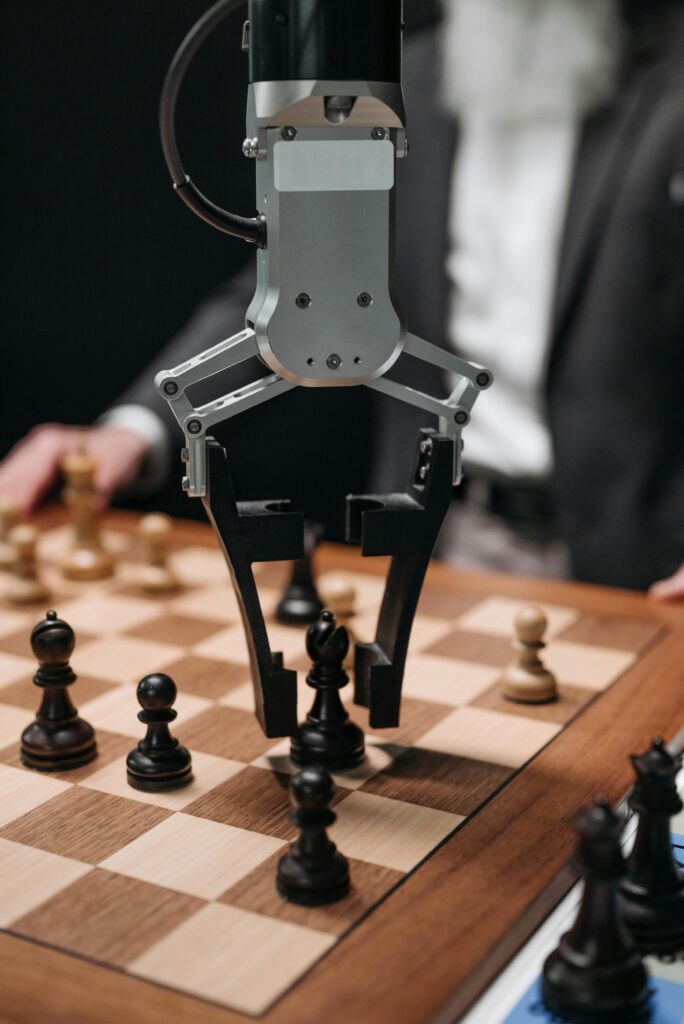 Robot and human playing chess symbolizing strategic thinking powered by AI homework helpers